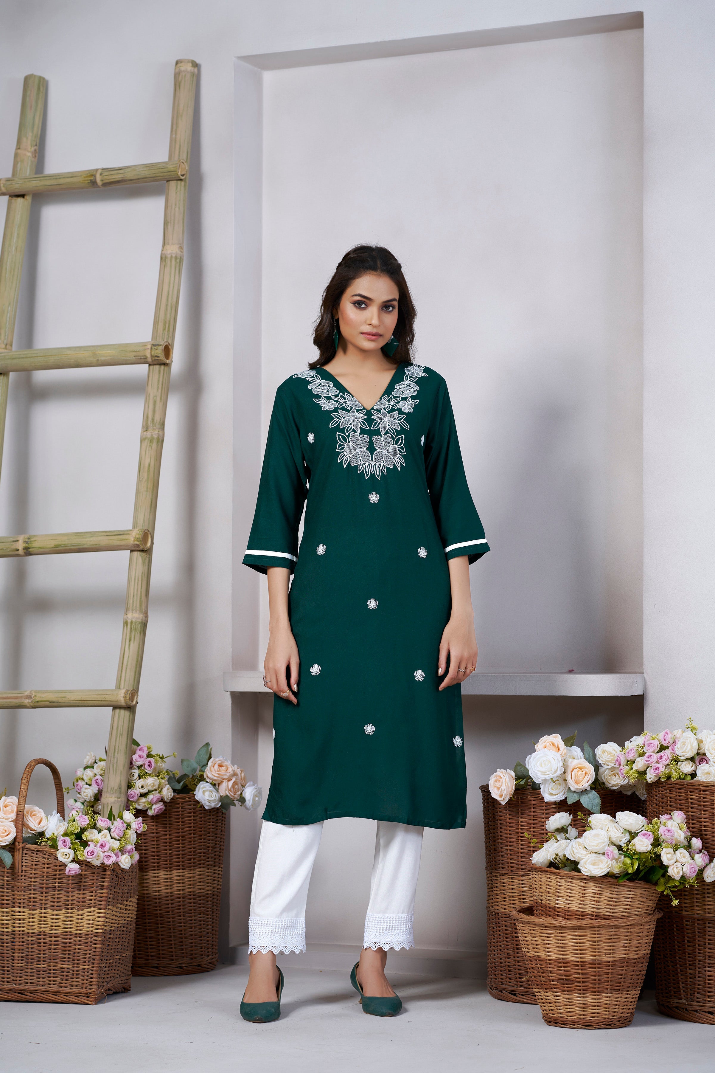 Green Viscose Rayon Kurti with Thread Work and 3/4 Sleeves with Stylish Neckline